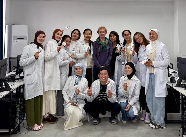 Nursing students in lab coats