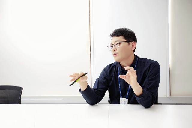 man presenting at table