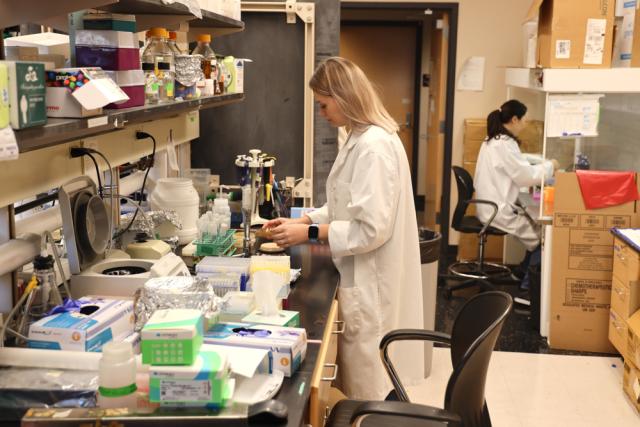 Female researcher in a lab.
