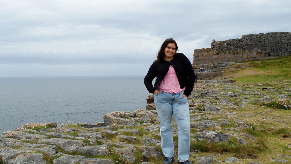Student on rocky coast in Ireland
