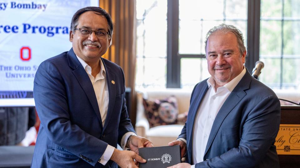 Two men shaking hands to solidify new partnership