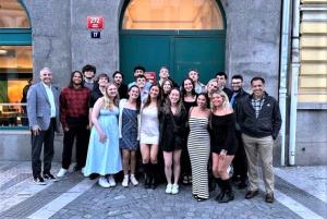 students posing outside a building