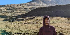 Male out in a field in the Andes.