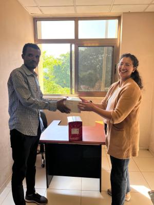 GOHi handing supplies a lab.