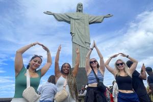 Students spell out O-H-I-O in front of Christ the Redeemer statue in Brazil.