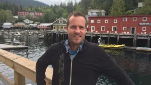 Male standing in front of canal