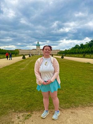 Student in front of palace