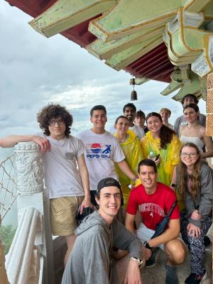 Piletz and students at the top of building in Taiwan