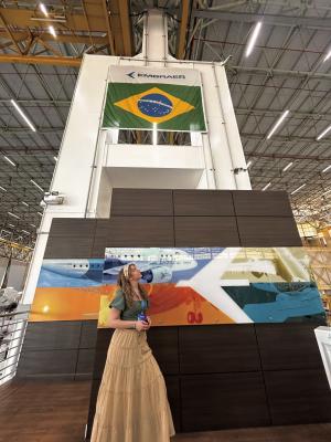 Woman looking up at flag