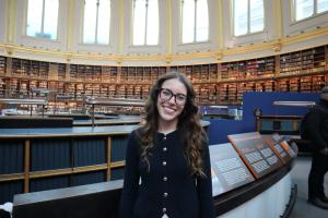 Student posing inside a building