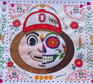 Drawing of Brutus Buckeye with half his face depicted using Day of the Dead imagery.