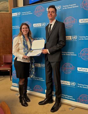 student receiving certificate