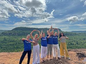 Students doing OHIO on a mountaintop