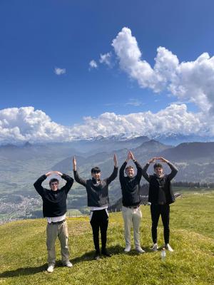 Students doing OHIO on a mountaintop