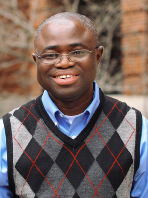 Outdoor headshot of male in glasses