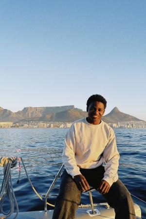 Student on a boat in South Africa