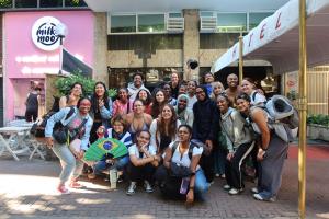 students in front of restaurant